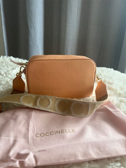 Dámska kabelka kožená Coccinelle peach cross